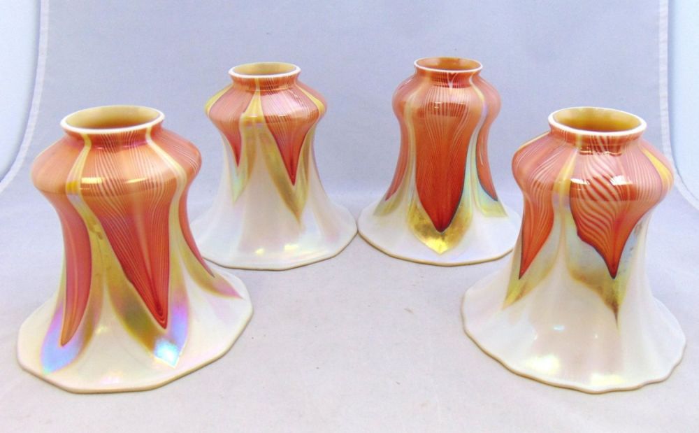 Lot 390: Four red pulled feather shades