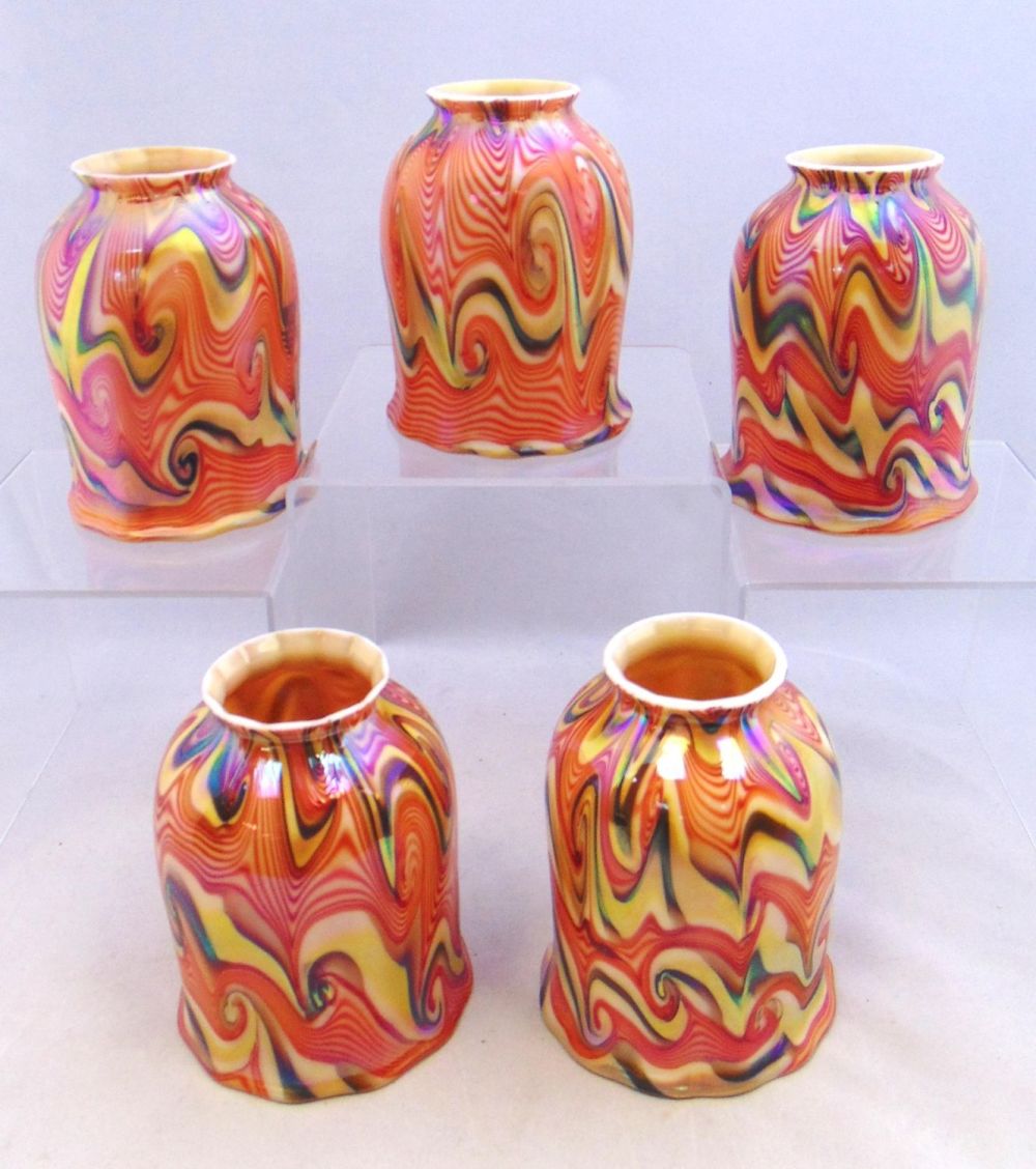 Lot 391: Group of five red art glass shades