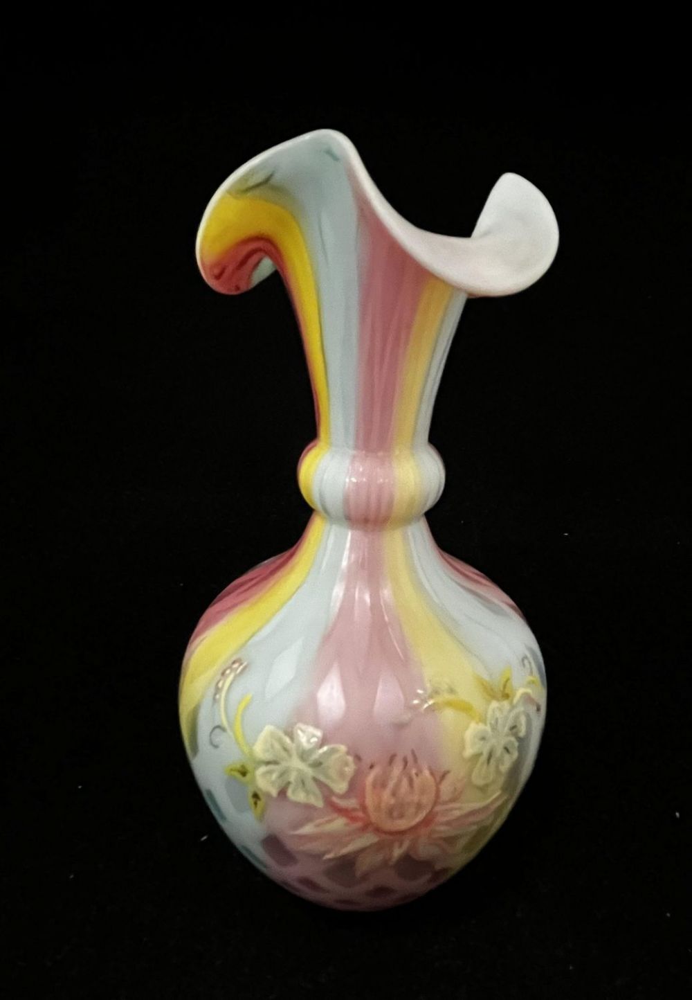 Lot 217: Rainbow decorated MOP glass vase