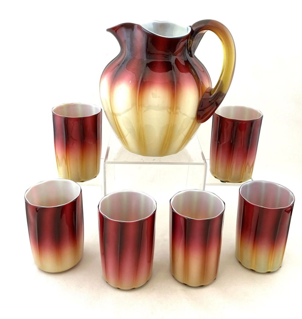 Lot 237: New England Plated Amberina water set