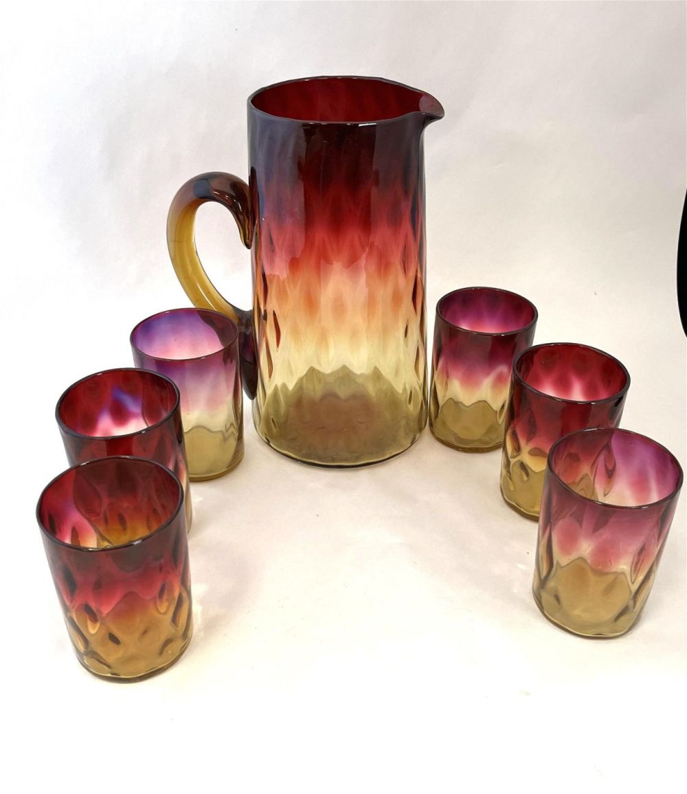 Lot 245: New England Amberina water set