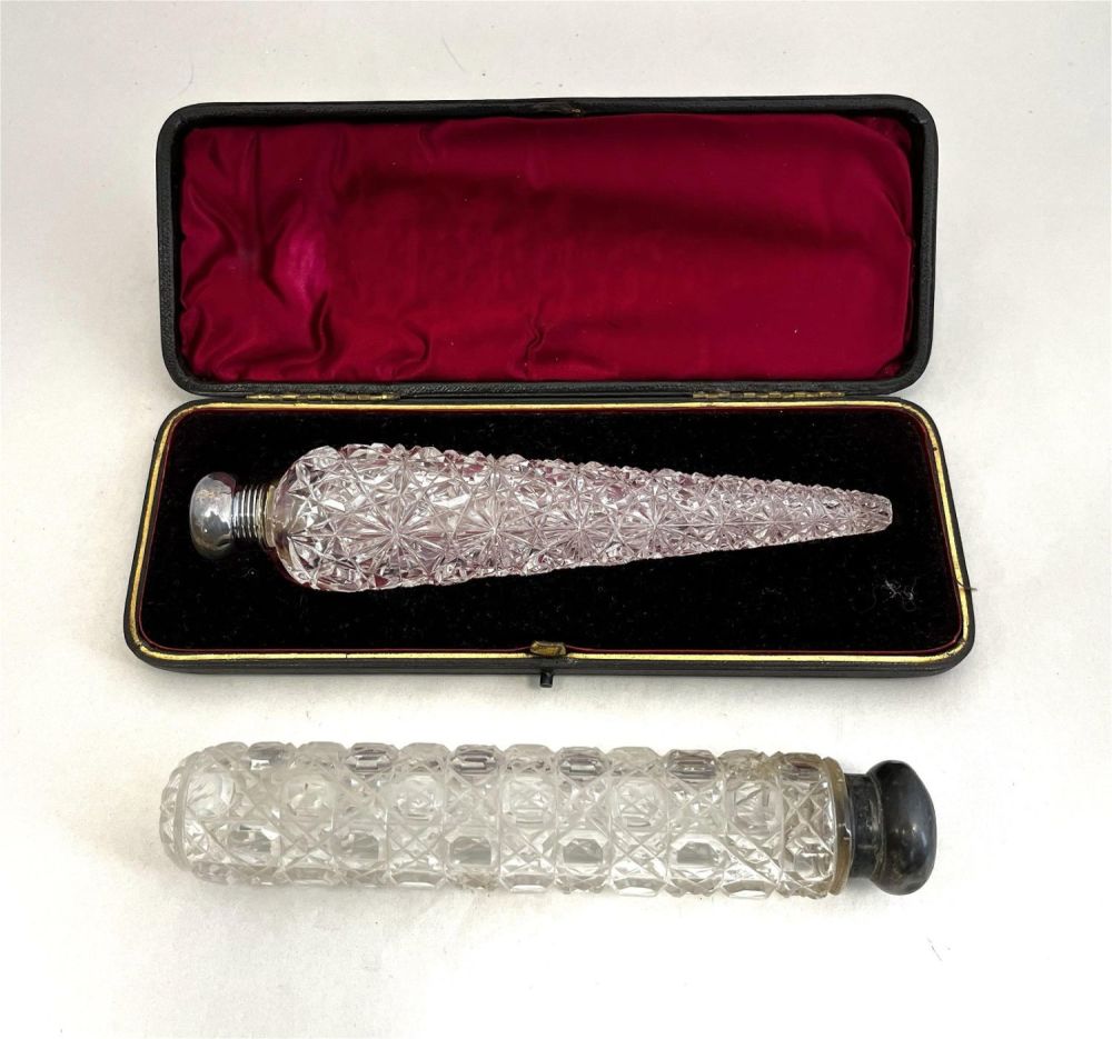 Lot 314: Two cut glass perfume bottles