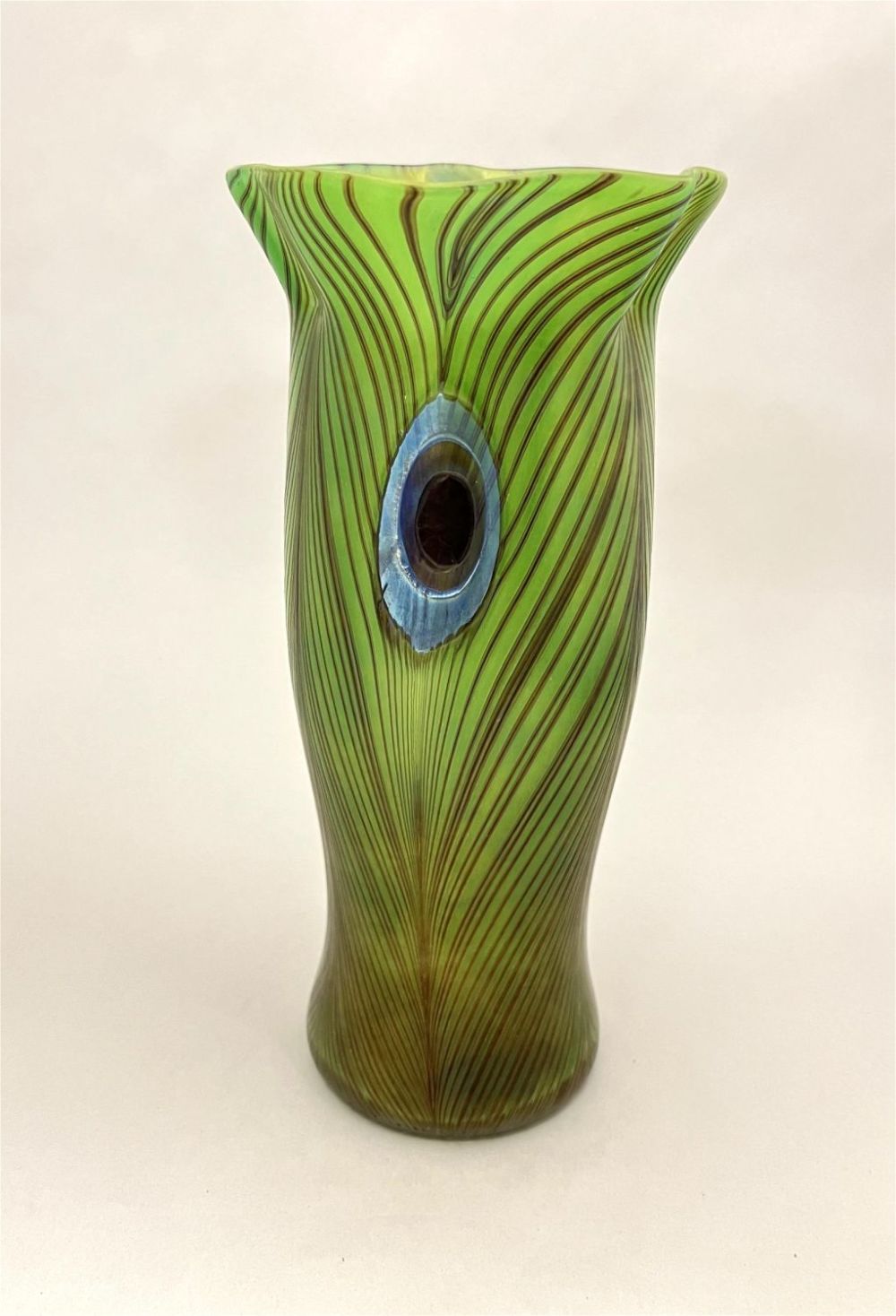 Lot 391: Contemporary peacock eye art glass vase