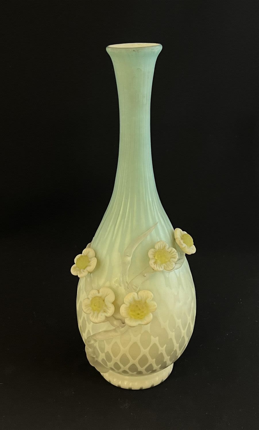 Lot 211: MOP bulbous applied stick vase
