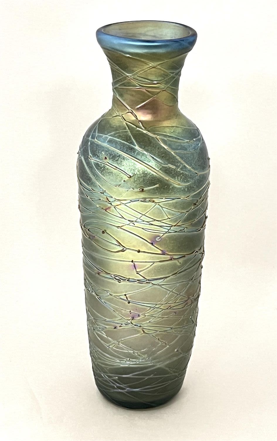 Lot 384: Blue iridescent threaded glass vase