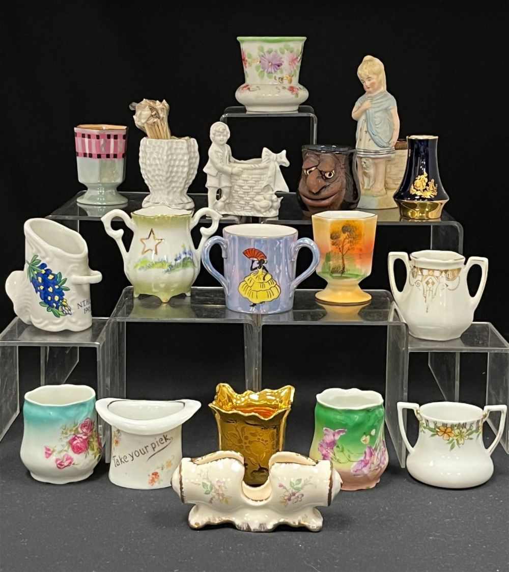 Lot 168: Group of 18 porcelain toothpicks