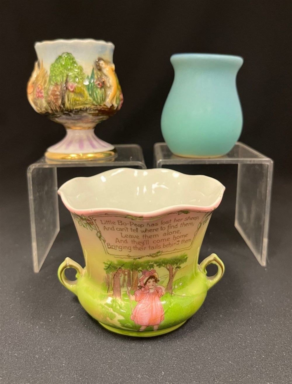 Lot 169: Three pottery and porcelain toothpicks