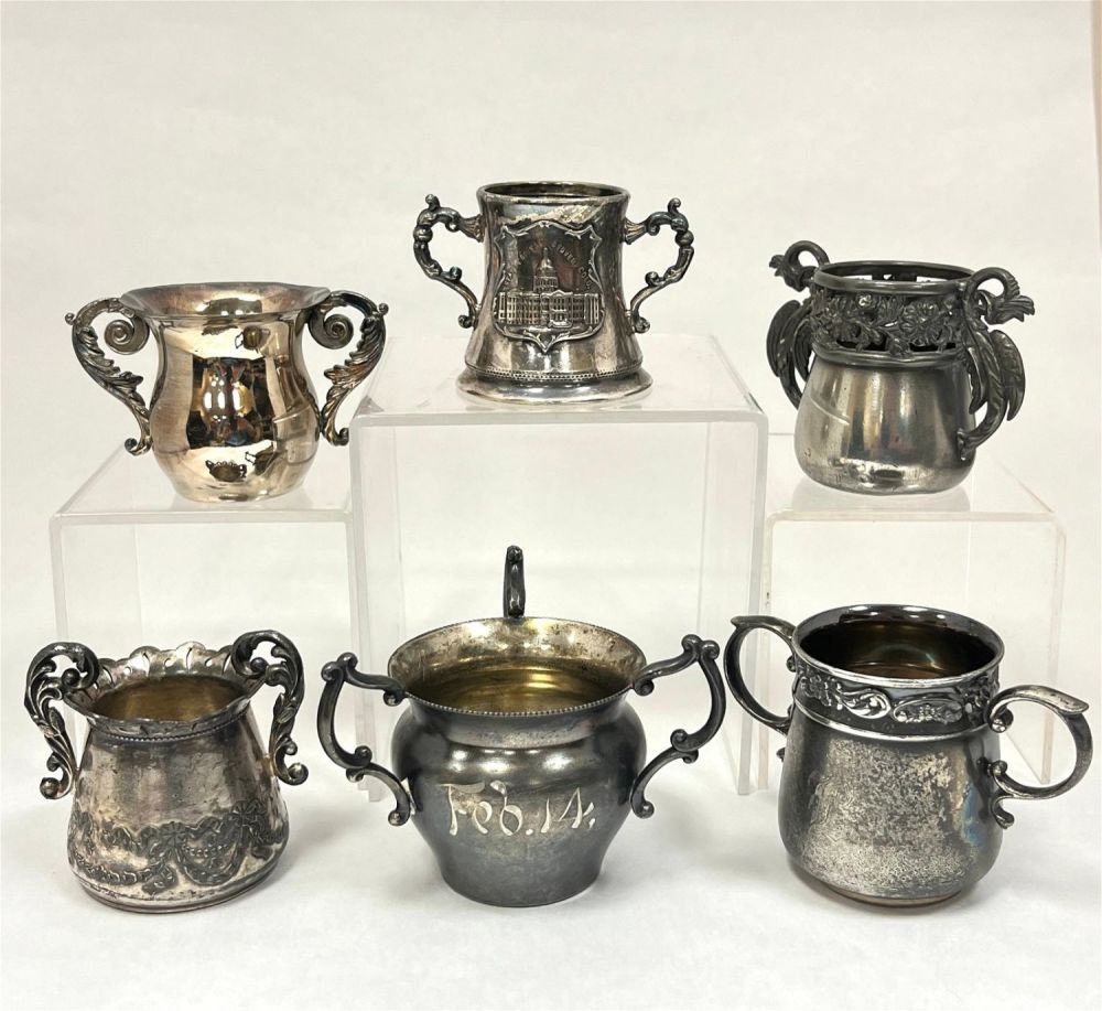 Lot 243: Six metal two handle toothpicks