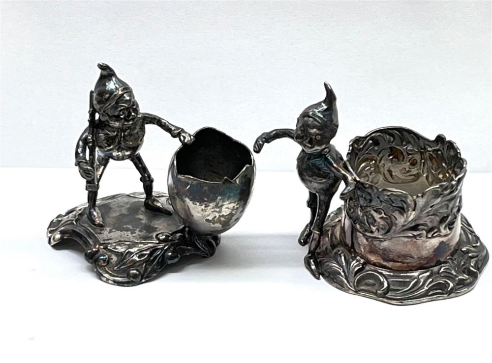 Lot 250: Two Palmer Cox Brownie holders
