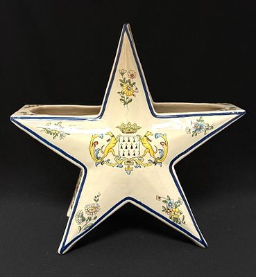 HB Quimper Star Vase. HB French faience star vase one side with 3 Breton men, the other has 