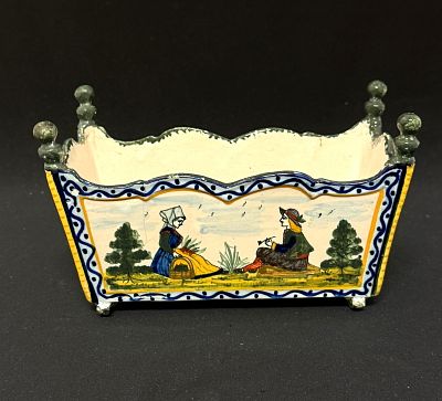HR Quimper Cradle. HR Quimper French Faience cradle with Breton couple; length 7 1/2". 
