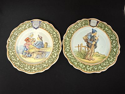 2 Porquier Beau Plates. 2 Porquier Beau French faience plates one with Breton Hiker and one with 