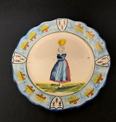 Quimper French Faience Plate. Quimper French faience plate with Bretonne carrying jug on head 