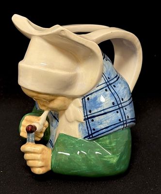 French Faience Toby Pitcher. Andre Galland HenRiot Quimper Toby pitcher of a Bretonne smoking; 