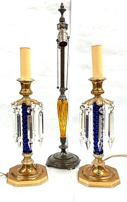 3 Pairpoint Glass Candle Lamps. 3 Pairpoint glass candle lamps one amber needs wiring, 2 blue 