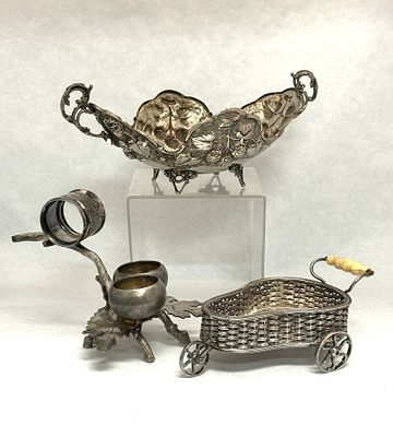 3 Silver Plate Items. 3 silver plate items including a condiment caddy, napkin ring/salt and 