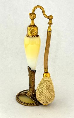 DeVilbiss Imperial Perfume Atomizer in yellow opaline fitted in a metal frame with jewels 