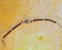 Leather bracelet with original "Widow's Mite" coin, 103-76 B.C.E. From archaeological Image - 1