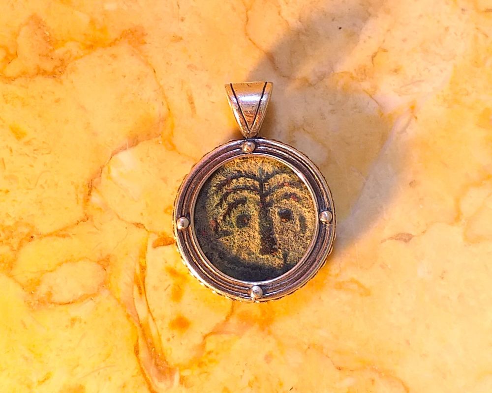 Silver pendant with original bronze prutah of Antonius Felix, procurator of Judea under 