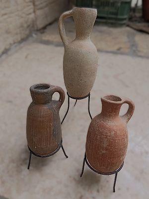 שלושה כלי חרס. Lot of three vessels as follows: Ceramic jug with lug handle, oval mouth, and 