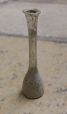 כלי זכוכית עתיקה. Tear glass with long neck; everted rim folded inwards; pushed in base with 
