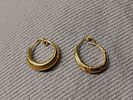 Pair of gold earrings on wax core; diam 1.3 cm; 1.0 grams. Roman; Professor Rachel Milstein Image - 2