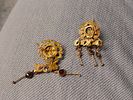 Two gold earrings, openwork floral design; both 1.9 cm; 3.5 grams. Roman; Professor Rachel Image - 2