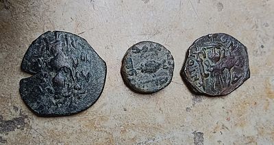 Lot of three copins; Umayyad fals depicting fish, from Beit Shean and dated 700-725 plus two 