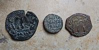 Lot of three copins; Umayyad fals depicting fish, from Beit Shean and dated 700-725 plus two Image - 1