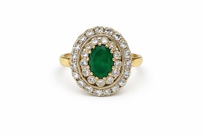 טבעת זהב 14K משובצת יהלומים באבן אמרלד טבעי 
במשקל: 7.4