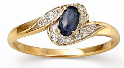 טבעת זהב 18K משובצת ביהלומים ואבן ספיר 
במשקל: 1.45