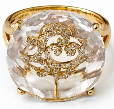 טבעת זהב 14K משובצת יהלומים ואבן חן 
משקל: 5.47