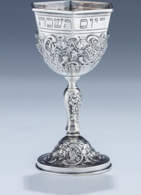A Silver Kiddush Cup. A SILVER KIDDUSH CUP. Germany, early 20th century. The round base 