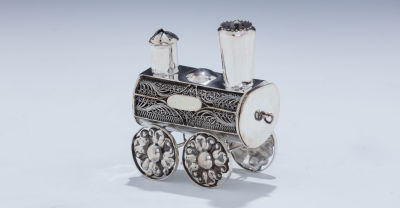 A Silver Spice Container. A SILVER SPICE CONTAINER. Poland, c. 1880. In the shape of a 