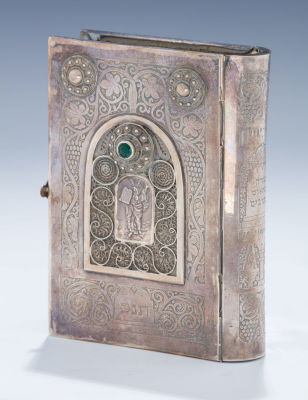 A Sterling Silver Binding With Original Tanakh by Bezalel. A STERLING SILVER BINDING WITH 