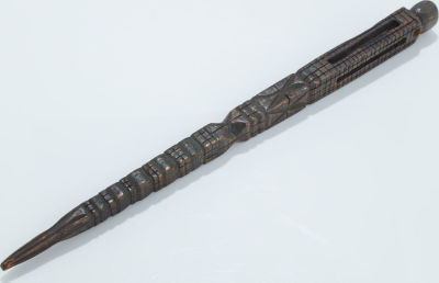 An Early Wooden Pointer. AN EARLY WOODEN POINTER. Galicia, c. 1850. Hand carved with geometrical 