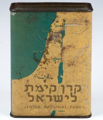 A JNF CHARITY BOX WITH ORIGINAL KEY. Palestine, c. 1930. The front with a map of the Holy Land. 
