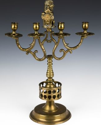 A LARGE BRASS SABBATH CANDELABRA. The Netherlands, late 19th century. On round base with four 