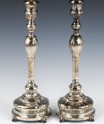 A PAIR OF LARGE SILVER SABBATH CANDLESTICKS. Probably Israel, 20th century. On four baroque 