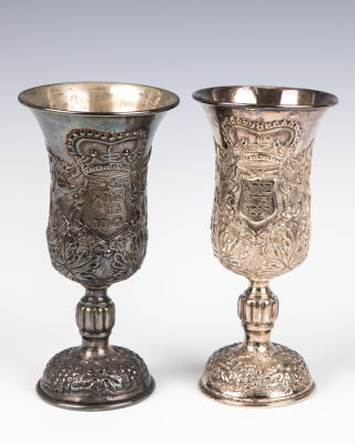 27. TWO LARGE 835 SILVER KIDDUSH GOBLETS. Continental, 20th century. Each embossed with 