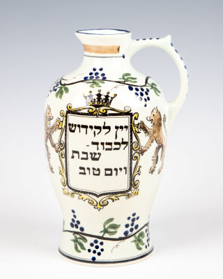 30. A LARGE CERAMIC WINE BOTTLE. Holland, 20th century. Decorated with hand painted lions 