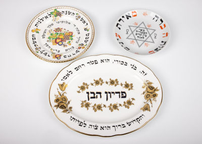 36. THREE PORCELAIN PLATES. Various origins, 20th centuries. Includes a German havdalah plate 