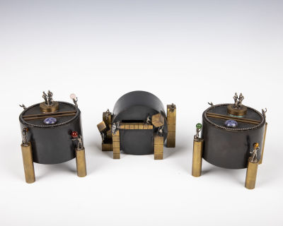 47. THREE HANDMADE CHARITY CONTAINERS BY WINGED CAMEL. Twentieth century. In arts and crafts 