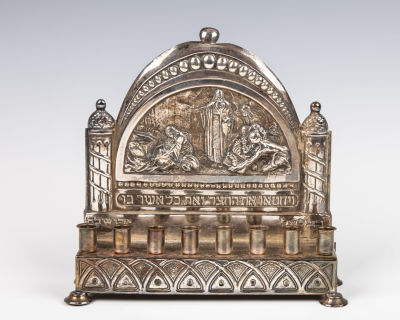 51. A SILVERPLATED HANUKKAH LAMP BY THE BEZALEL SCHOOL. Jerusalem, c. 1930. The back is 