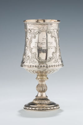 1. A LARGE STERLING SILVER KIDDUSH GOBLET. Birmingham, 1862. On a round base. Embossed with 