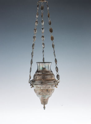 3. A SILVER NER TAMID. Probably Egypt, c. 1880. Traditional form with hand made chain and 