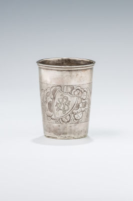19. A SILVER KIDDUSH BEAKER. Poland, c. 1885. Engraved with winged eagles and a filled 