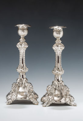 41. A PAIR OF SILVER SABBATH CANDLESTICKS. Austria, c. 1880. Each is decorated with lion's 