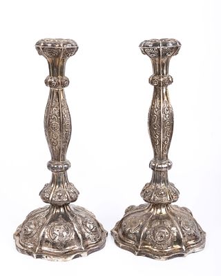 A LARGE PAIR OF SILVER SABBATH CANDLESTICKS. Germany, c. 1857. On stylized round bases chased 
