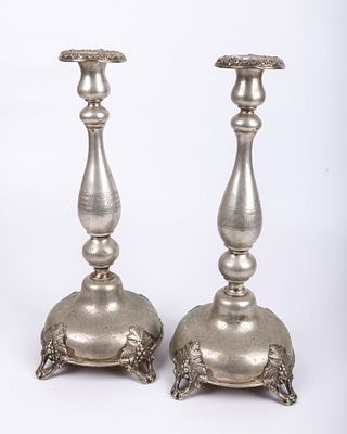 A LARGE PAIR OF SILVER SABBATH CANDLESTICKS.Germany, c. 1880. On round bases engraved with 
